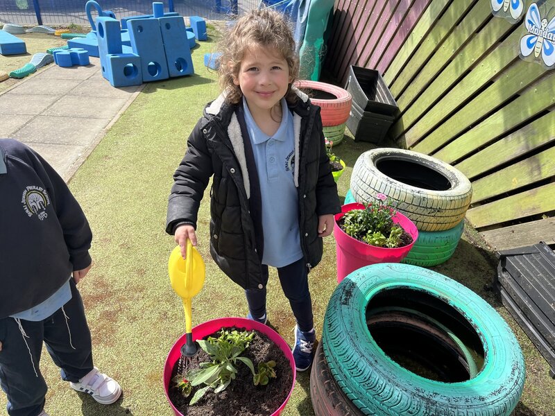 Image of Nursery plant their own garden as part of 'Growing' topic 